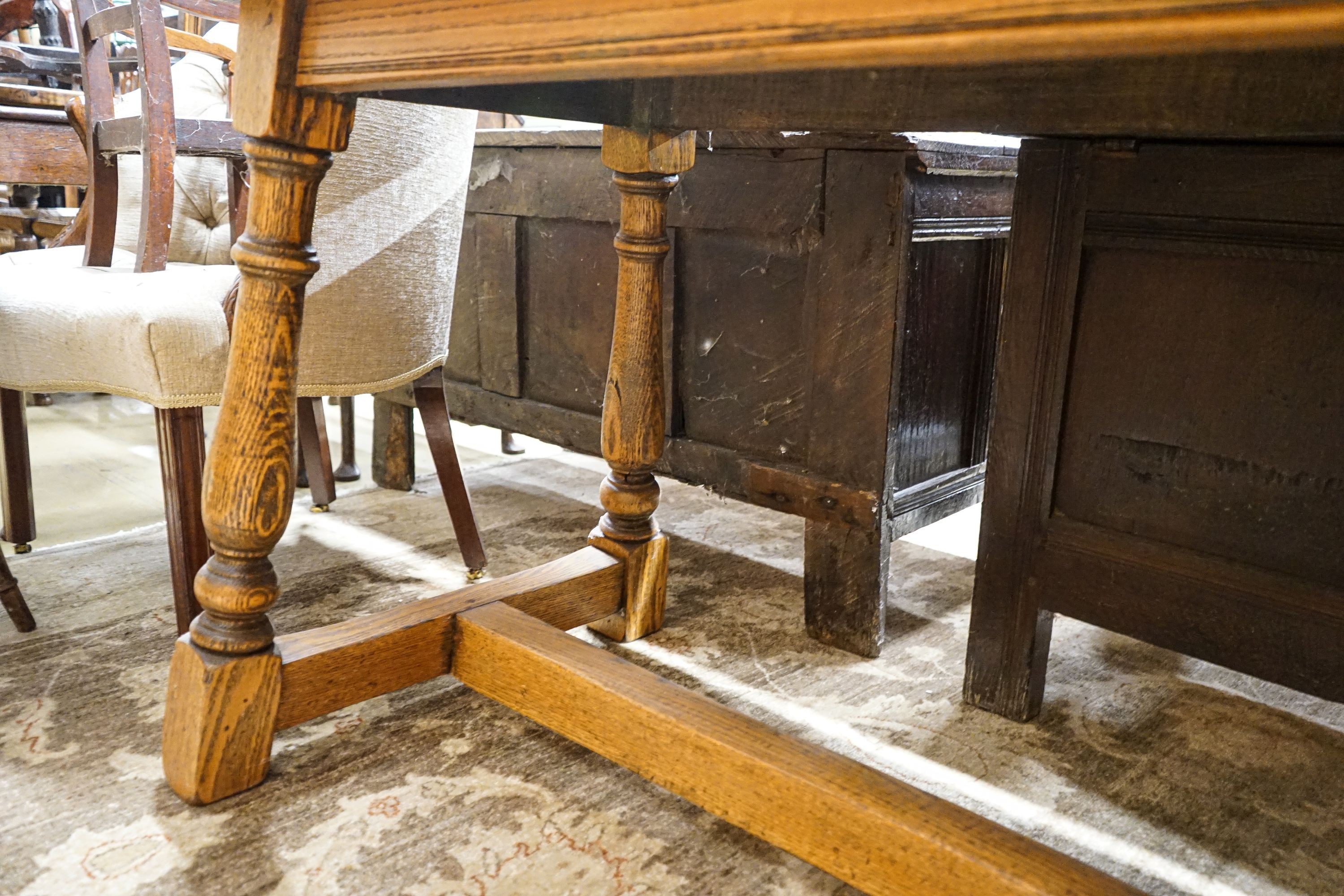 An 18th century style rectangular oak refectory dining table, length 202cm, depth 78cm, height 80cm